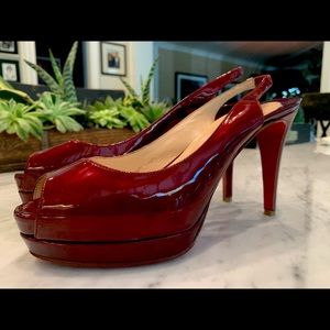 Red patent leather Christian Louboutin peep toes